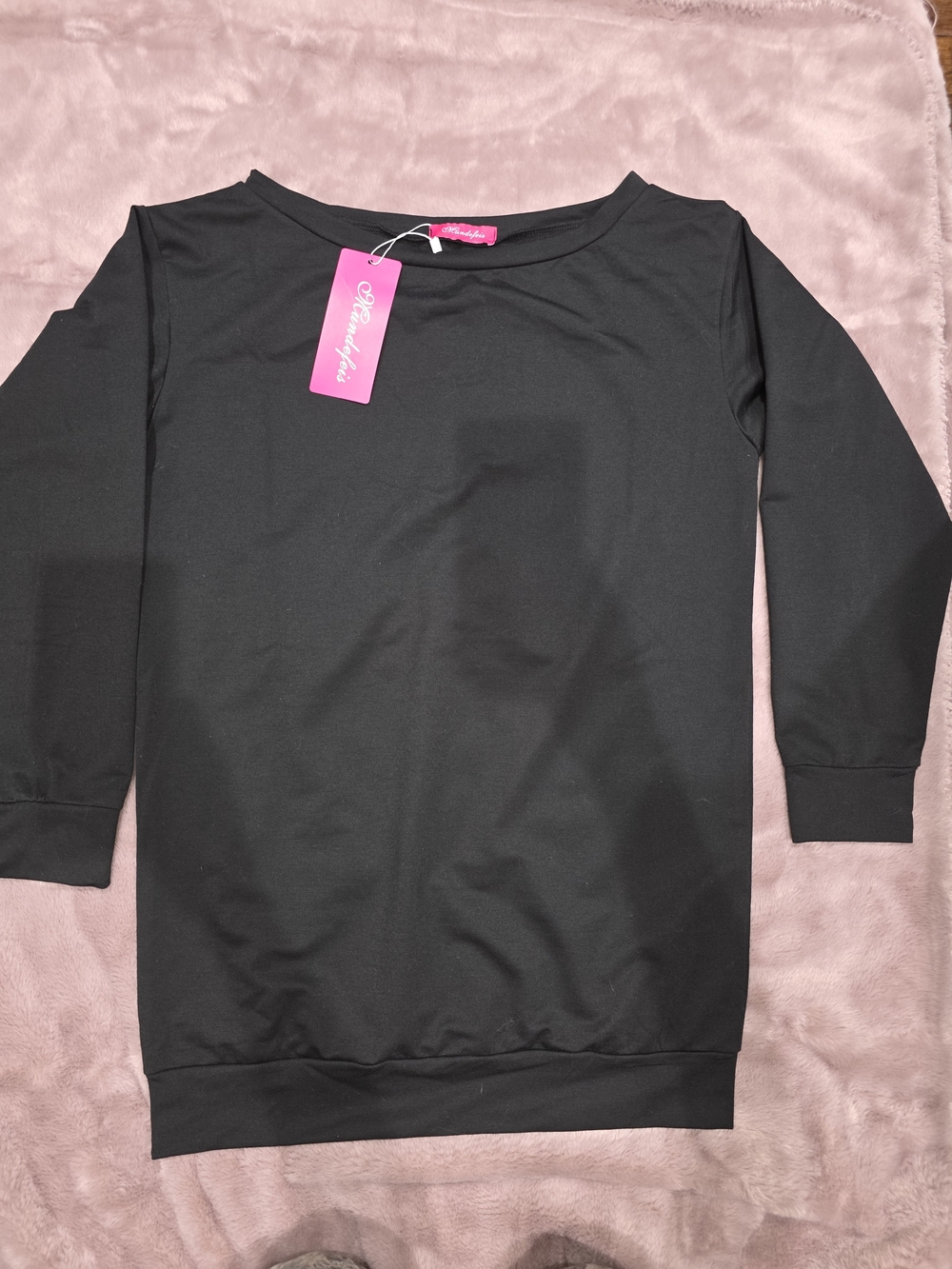Black Top With Angel Wings On The Back